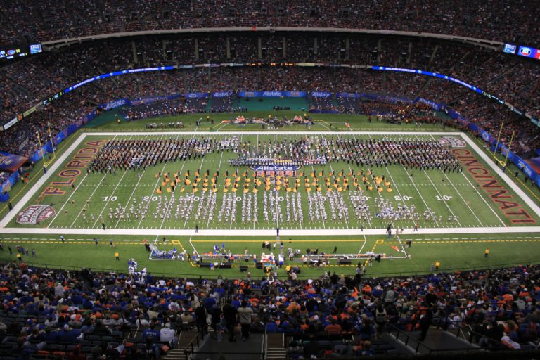 Barstow High School Aztecs marching band performing at the Alamo Bowl